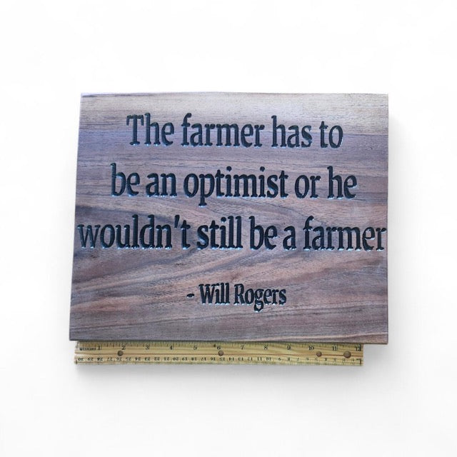 "The farmer has to be an optimist or he wouldn't still be a farmer"- Wooden sign