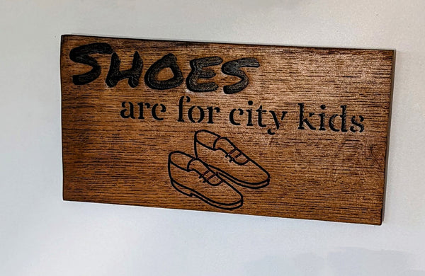 “Shoes Are for City Kids” Engraved Wooden Sign