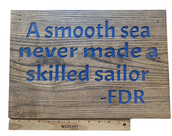 “A Smooth Sea Never Made a Skilled Sailor” Wooden Quote Sign