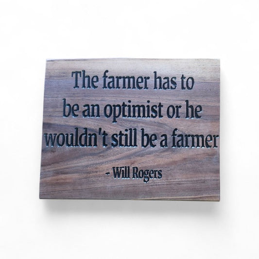 "The farmer has to be an optimist or he wouldn't still be a farmer"- Wooden sign